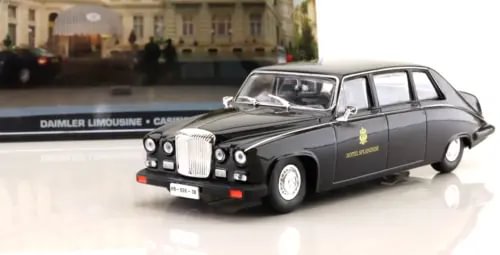 Dark Daimler limousine diecast model car with chrome grille and front lights