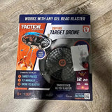 Target drone toy in retail box, blue and orange artwork, screen graphic and controls