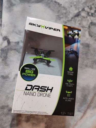 Sky Viper DASH nano drone retail box with green quadcopter graphics and text
