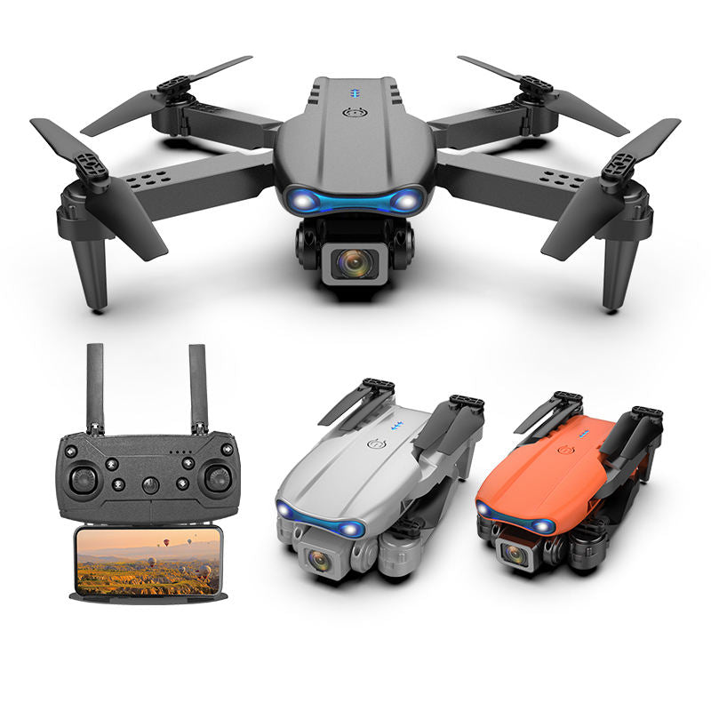 Mini quadcopter drone with foldable propellers, front camera and blue LED lights