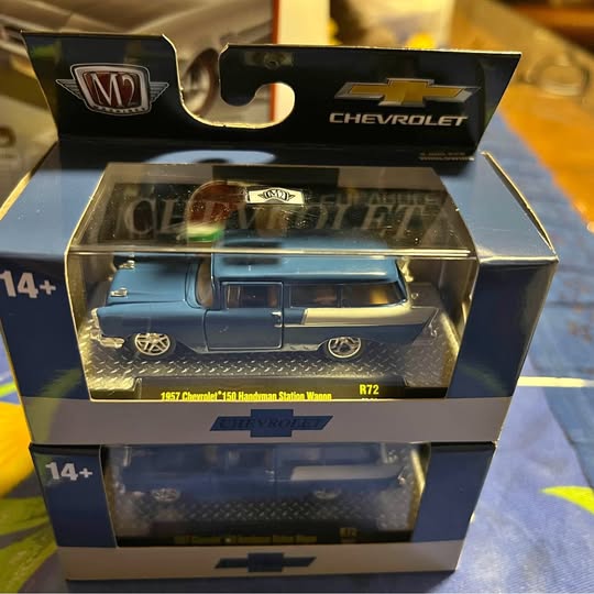 Blue Chevrolet R72 diecast car in retail box, front window and logo