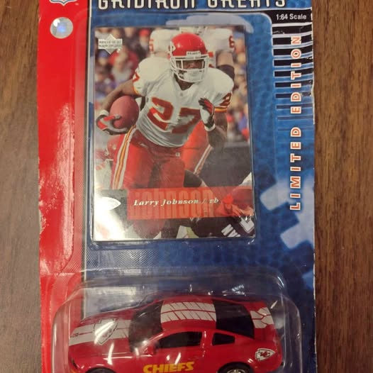 Kansas City Chiefs diecast mini car, red with white stripes, in blister pack