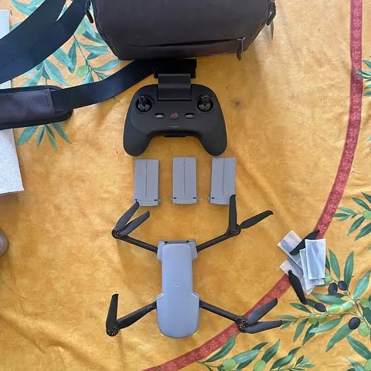 Drone controller, body, and propeller arms with spare batteries included