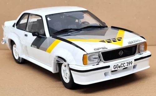 Sunstar white diecast Opel Ascona 400 street car model with yellow racing stripes