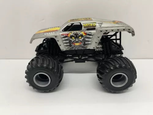 Gray monster truck die-cast with large black tires and detailed front grille