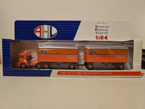 1:64 orange Mack truck tandem diecast model in retail box