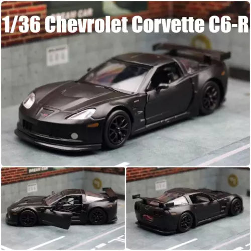 1/36 scale diecast Corvette C6-R model car, dark gray/black, front 3/4 view