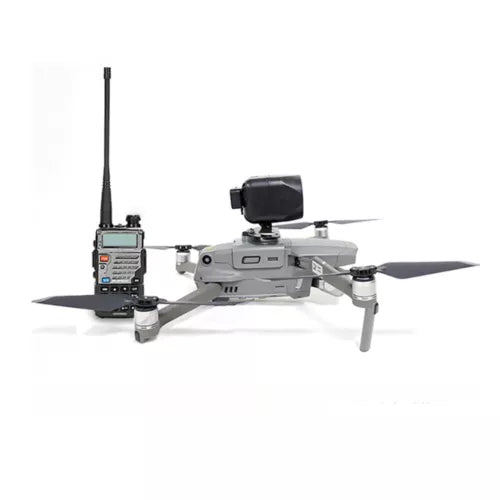 Drone megaphone speaker mount with black horn and remote controller, on gray drone body