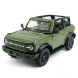 Green open-top Ford Bronco diecast model car, 1:36 scale toy with detailed interior