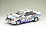 White rally diecast model car, #6, blue and yellow racing stripes