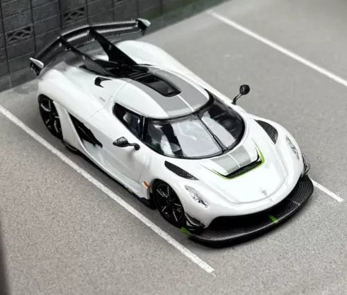 White 1:64 super racing diecast model car with black aero details