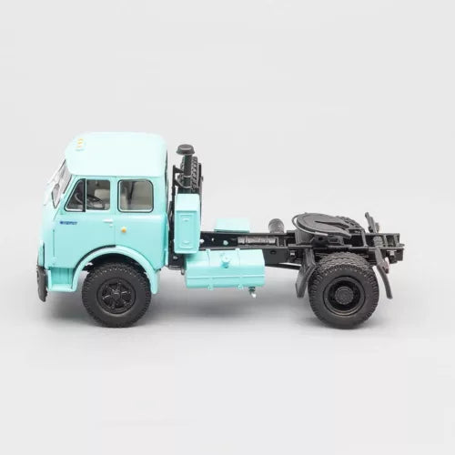 Turquoise truck diecast model with black chassis and front wheels