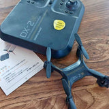 Blue quadcopter drone with four propellers and central body