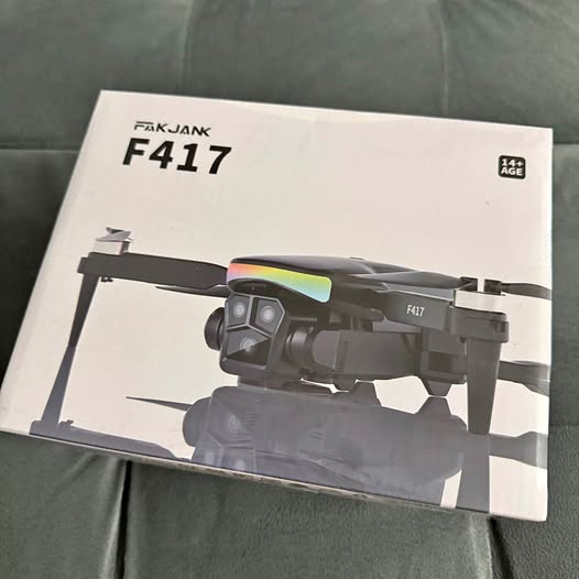Camera drone with dual front cameras, grey frame and colorful top strip