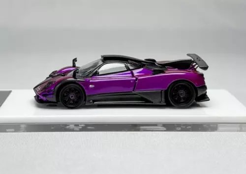 Purple and black sports diecast car model, open-wheel rear spoiler detail