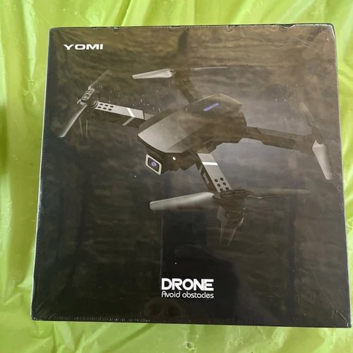 Drone 17 drone retail box with drone illustration and YOMI branding
