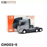 1/64 scale grey diecast truck tractor with black grille and cab, front view