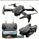 Foldable gray quadcopter drone with camera, plus handheld remote controller