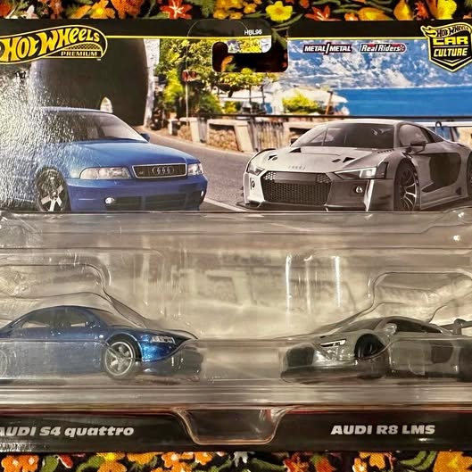 Diecast car set with blue Audi S4 quattro and gray Audi R8 LMS in clear case