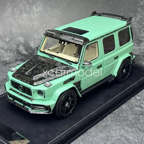 Mint green 1:18 diecast model SUV car with black wheels and detailed front grille