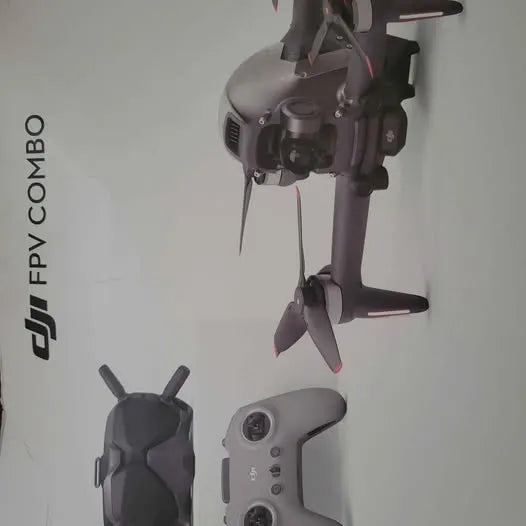 Gray quadcopter drone with four propellers and camera gimbal front view