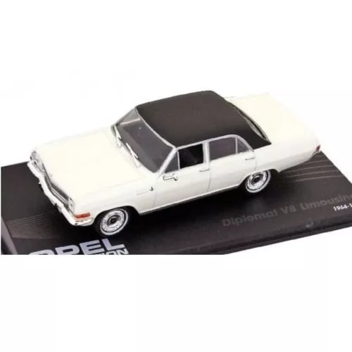 White classic limousine diecast model car with dark roof, front three-quarter view