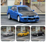 Blue metal diecast model car, front three-quarter view, 1:64 scale sedan