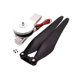 Brushless drone motor with black propeller blades and carbon tube mount