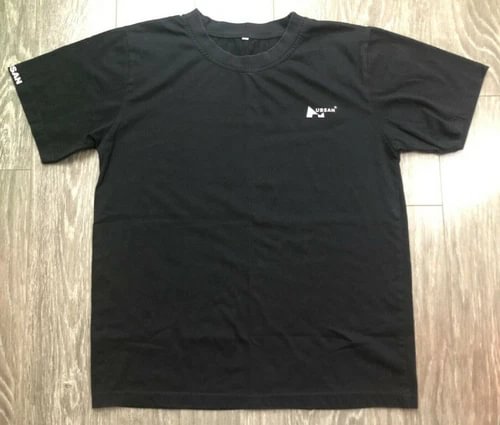 Women's black T-shirt with small drone graphic on chest