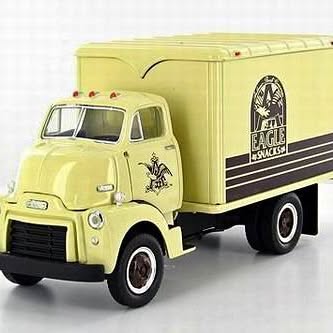 Lemon yellow 1/34 scale diecast GMC box truck with Eagle Snacks side graphic