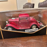 Red 1932 Ford Coupe diecast model car with clear display box and white base label