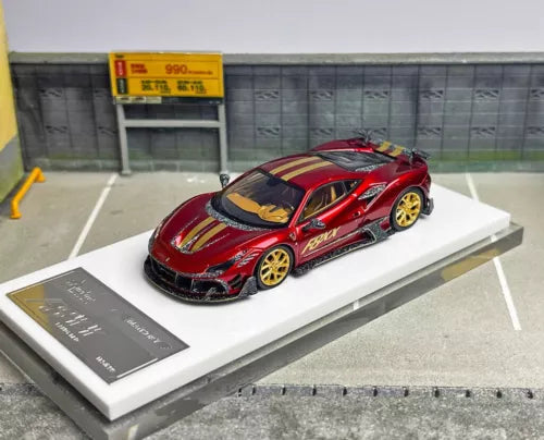 Red racing sports diecast model car with black hood and gold stripes, 1:64 scale