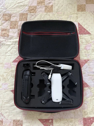 DJI Spark drone accessory case with drone body, props, controller and cables
