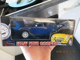 Blue mini cooper diecast model car in retail display box