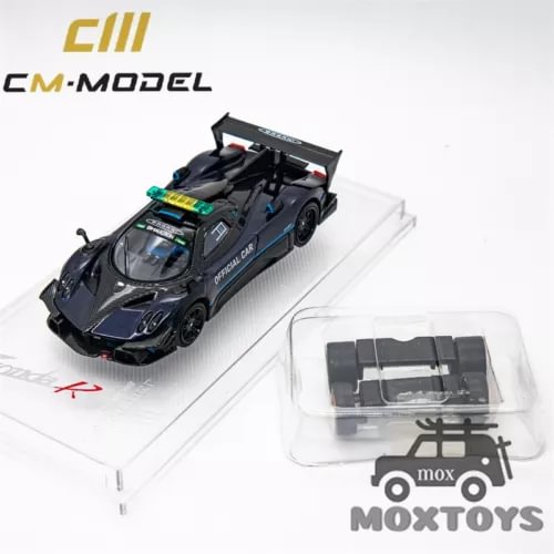 Dark blue 1:64 diecast race car model with accessory blister packaging