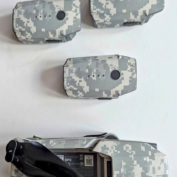 Camouflage storage case for drone accessories