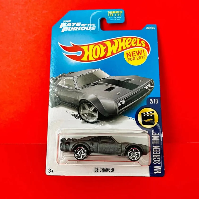 Grey diecast muscle car in Hot Wheels blister pack, Ice Charger model