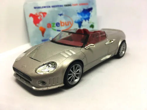 Silver convertible sports car diecast model, front three-quarter view with open top