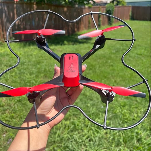 Fuse X22 titanium drone with four red propellers and black circular frame