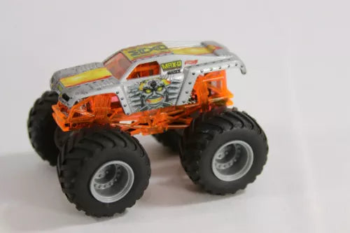 Hot Wheels MAX-D diecast monster truck, orange body, gray roll cage, black monster tires