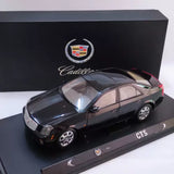 Cadillac CTS 2004 diecast model sedan, dark gray, with display base