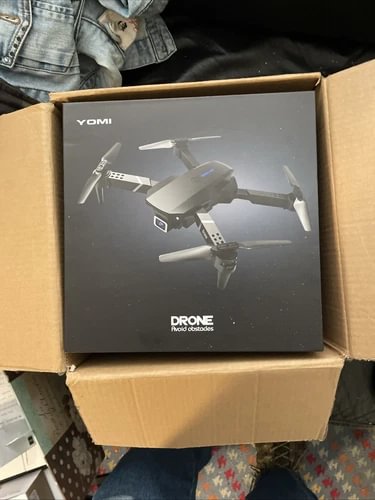 Yomi drone product box with printed quadcopter and obstacle-avoid graphic
