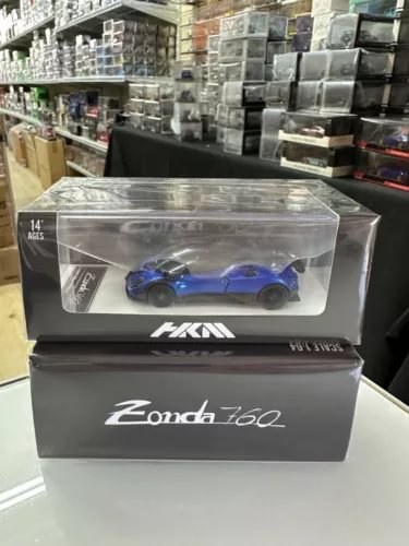 Blue 1/64 scale diecast car model in HKM display box, removable hood detail