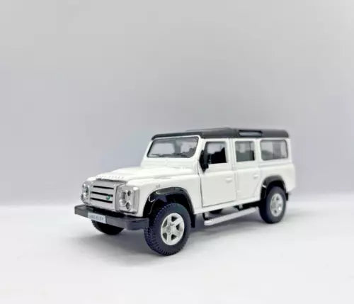 White 1:36 scale Land Rover Defender diecast toy car, front three-quarter view.