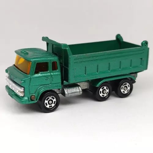 Green diecast dump truck with cab and open dump bed