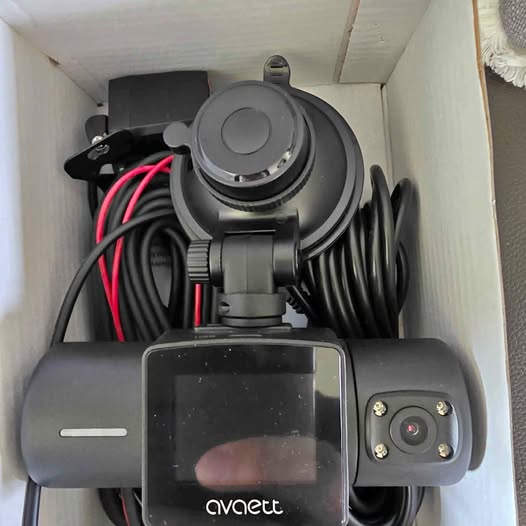 Dash camera with avaett display screen and front lens, gray body