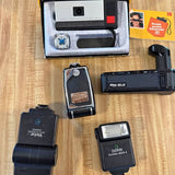 Camera accessory kit with flash and light accessories in open case