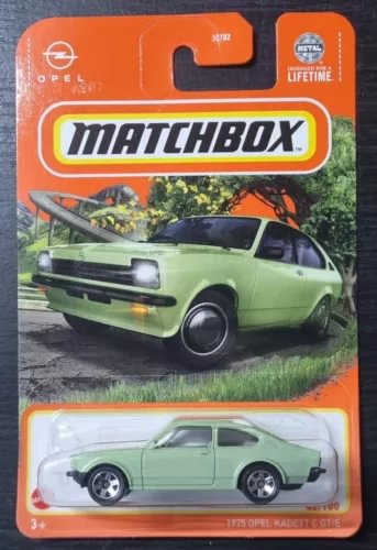Green Opel Kadett C GT/E Matchbox diecast car in blister packaging, orange card.