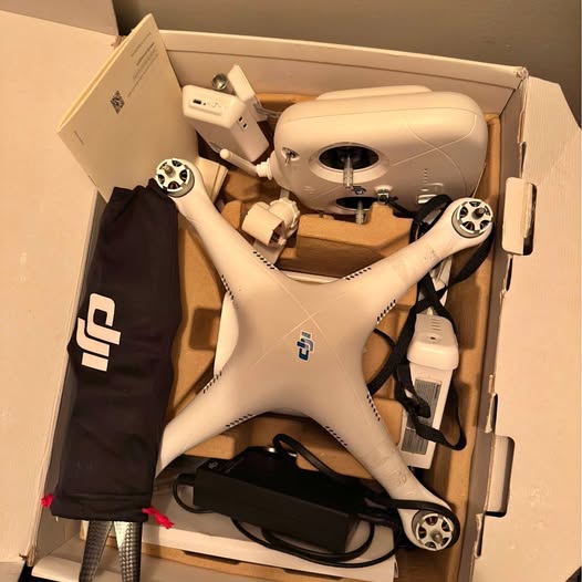 DJI Phantom Augusta GA drone with white quadcopter and controller in packaging