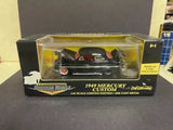 Black 1949 Mercury Custom diecast car model in clear display box, 1:43 scale